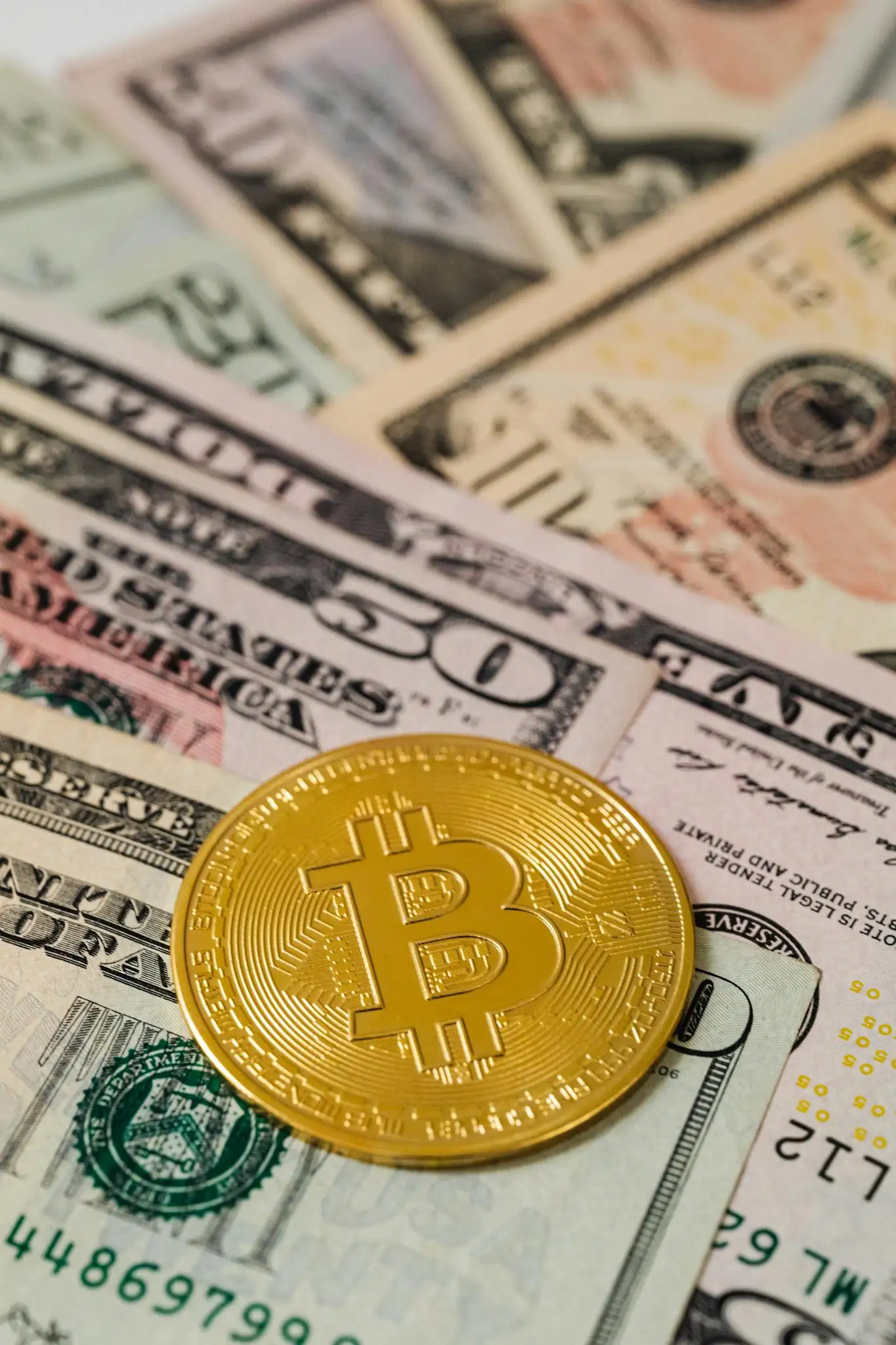 Gold Bitcoin Coin and Cash 